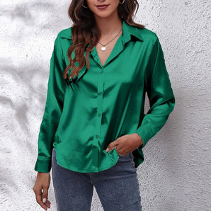 Emerald green satin long sleeve button-down blouse with a collared neck, designed in a plus size (2XL).
