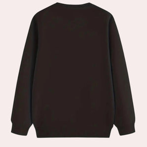 Men's black crewneck sweater displayed with a focus on its classic, casual knit design. The sweater features long sleeves and a round neckline, suitable for everyday wear.
