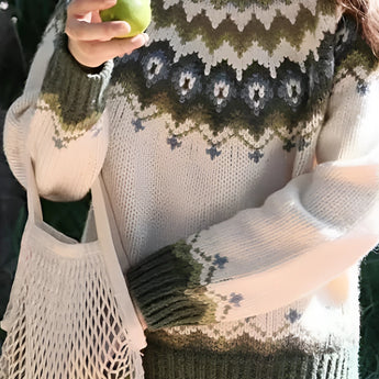 Cozy women's Nordic knit sweater in green, featuring a crew neck design with intricate Fair Isle patterns. The sweater is styled with long sleeves and a comfortable fit, ideal for 2XL size, perfect for winter fashion.