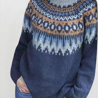 A blue Fair Isle wool sweater in size 2XL, featuring a Nordic winter pullover design with intricate patterns and shades of white, purple, and grey. The sweater showcases long sleeves and a comfortable fit, suitable for cold weather.