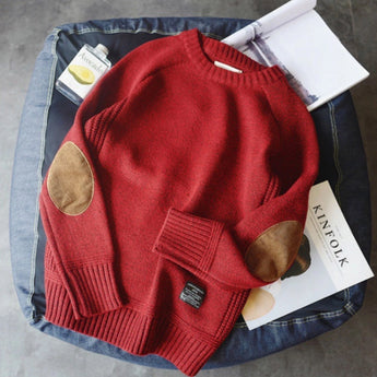 A cozy red women's sweater in size 4XL featuring stylish suede elbow patches, long sleeves, and a comfortable knit design.