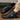 Men's white high-top designer sneakers with urban streetwear style, featuring a sleek design and athletic build suitable for both fashion and outdoor activities.