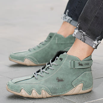 Men's white high-top designer sneakers with a sea green suede accent, featuring a stylish urban streetwear design.