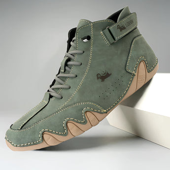 Men's white high-top designer sneakers for urban streetwear, showcasing a sleek and modern design with a focus on comfort and style, suitable for athletic and outdoor activities.