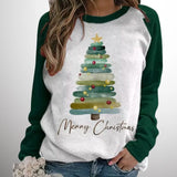 Festive women's Christmas tree sweatshirt in dark green, size 3XL, featuring a holiday-themed graphic, paired with jeans.