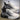 Men's sneakers with a futuristic flame design featuring a mix of blue, white, and black colors, size 47. The shoes have a sporty and trendy aesthetic, combining elements of electric blue and grey tones, suitable for athletic and casual wear.