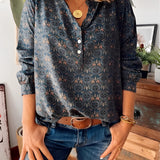 Floral Boho Chic Women's Blouse with long sleeves and a mandarin collar, shown paired with denim jeans.