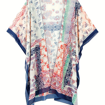 Woman wearing a lightweight floral boho kimono cardigan with short sleeves and an open front, styled as a summer cover-up.