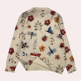 Floral and butterfly embroidered women's crew neck sweater with intricate detailing, featuring long sleeves and a comfortable fit.