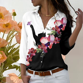Stylish women's blouse featuring a floral cat silhouette print on a white background, available in size 5XL. The design includes black floral patterns, short sleeves, and a classic neckline.