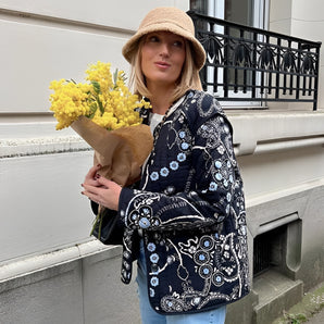 Women's bohemian paisley jacket with floral embroidery, featuring long sleeves and vibrant patterns ideal for spring outerwear.