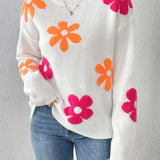 Cozy women's floral knit sweater in a vibrant pink hue, featuring long sleeves and a rounded neckline, perfect for autumn and winter fashion.
