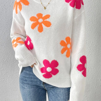 Cozy women's floral knit sweater in a vibrant pink hue, featuring long sleeves and a rounded neckline, perfect for autumn and winter fashion.