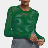 Green floral maxi dress featuring puff sleeves, high slit, and boho style, worn by a person in size XL.