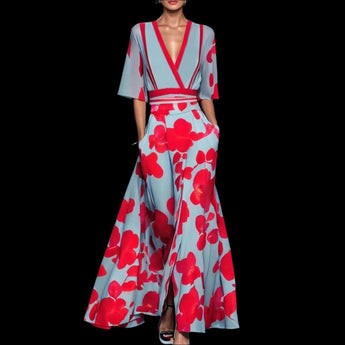 Floral maxi dress featuring a red poppy print, v-neckline, belted waist, and a high slit, designed for a fashionable and elegant look.
