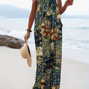 Sleeveless floral maxi dress with a bohemian style, suitable for summer beachwear, featuring a flowing design that highlights the waist and extends to the thighs.