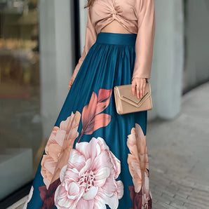 Floral maxi skirt and blush pink crop top set in 3XL, featuring a flowing design with floral patterns, showcased against a bright background.