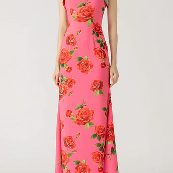 Pink floral mermaid dress with ruffles, featuring a fitted waist, short sleeves, and a shoulder design. Ideal for garden parties.