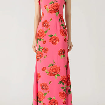 Pink floral mermaid dress with ruffles, featuring delicate sleeves and a fitted waist, perfect for garden parties.