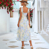 Pastel garden party floral midi dress with short sleeves, featuring a white base with colorful flower patterns, perfect for vacation or a casual day out.