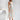 Apricot floral midi dress in a pastel garden party style, featuring a fitted waist, sleeveless design, and flowing skirt, suitable for vacation or casual wear, shown in size XL.