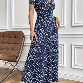 Brown floral midi dress with short sleeves and a fitted waist, designed for casual summer wear.