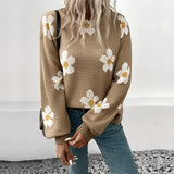 Oversized brown crewneck sweater with a floral design, featuring daisy spring knitwear pattern.