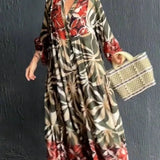 Floral print long sleeve button-front maxi dress with a relaxed fit, featuring a defined waist, and a flowing skirt for a casual chic look.