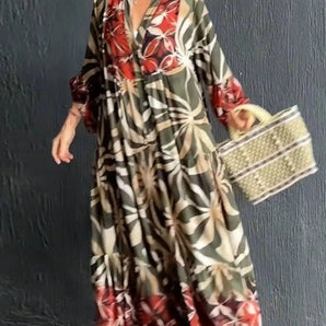 Floral print long sleeve button-front maxi dress with a relaxed fit, featuring a defined waist, and a flowing skirt for a casual chic look.