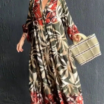 Floral print long sleeve button-front maxi dress with a relaxed fit, featuring a defined waist, and a flowing skirt for a casual chic look.