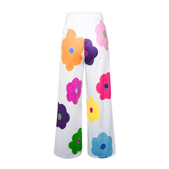 High-waisted women's summer trousers with a vibrant floral print design.