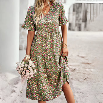 Green apricot floral print short sleeve asymmetrical summer dress in XL size, featuring a chic and lightweight design with a focus on shoulder and waist detailing.