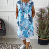 Blue floral print sleeveless summer tunic top for women, size 3XL, featuring a relaxed fit and vibrant floral patterns.