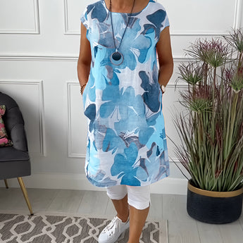 Blue floral print sleeveless summer tunic top for women, size 3XL, featuring a relaxed fit and vibrant floral patterns.