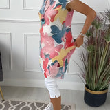 Floral print sleeveless summer tunic top for women featuring a white background, showcasing neck and shoulder details, worn by a standing model.