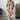 
A multicolor 3XL floral print sleeveless summer tunic top for women, showcasing vibrant flower patterns and a flowing design that falls to mid-thigh.