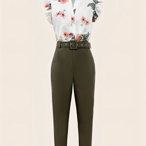 Floral puff sleeve blouse paired with high-waisted olive trousers, showcasing an elegant office outfit style.
