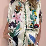 Women's floral silk blouse in size 3XL, featuring a designer patterned print with a classic collar, long sleeves, and a flattering fit.