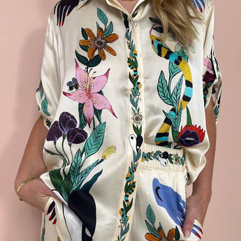 Women's floral silk blouse in size 3XL, featuring a designer patterned print with a classic collar, long sleeves, and a flattering fit.