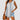 
A woman wearing a gray sleeveless floral top, suitable for summer and casual occasions. The blouse has a flattering neckline and is designed for a comfortable fit in size 2XL.