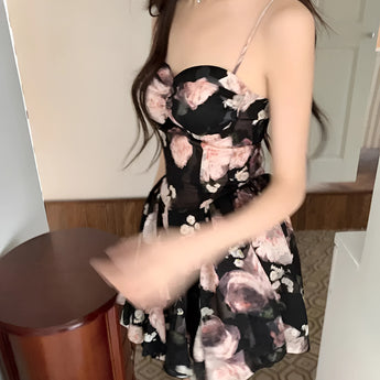 Elegant black strapless mini dress with floral patterns, showcasing a stylish party wear design.