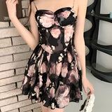 Elegant black floral strapless mini dress for parties, showcasing a fitted waist and a short hemline, suitable for size L.