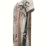 Elegant pink and black floral stripe short sleeve summer dress with a fitted waist and classic collar.