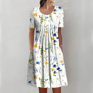 A white, knee-length, sleeveless floral summer dress made of lightweight cotton in size XXXL, featuring a fitted waist and round neckline.