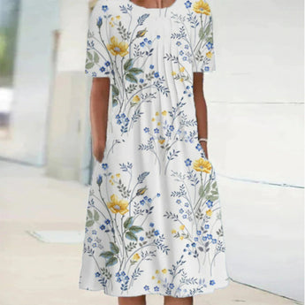 White botanical print floral summer dress for women, featuring short sleeves and a midi length. The dress is styled in a white and yellow color palette and is available in size 3XL.