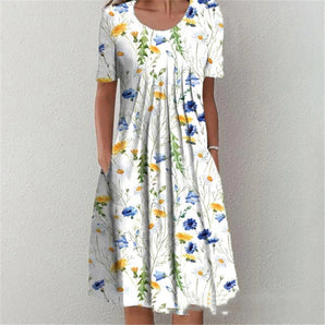 White botanical print floral summer dress for women, featuring short sleeves and a midi length. The dress is designed with a focus on shoulders and waist, suitable for daytime wear.