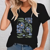 Floral V-Neck Women's T-Shirt in dark green, featuring eco-friendly fabric, displayed in Nero color and size 3XL, showcasing a floral design across the shoulder and neckline.