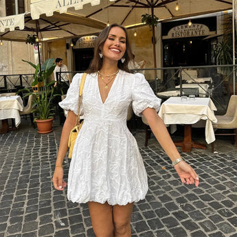 Floral white puff sleeve V-neck short summer dress for women, displayed in size 2XL, showcasing a stylish and airy one-piece garment with a cinched waist and elegant design.