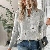 A cozy gray high-neck wool sweater with a floral design, styled for women, in size 2XL.