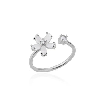 Elegant flower-shaped diamond engagement ring with marquise solitaire in silver, featuring a botanical floral design.
